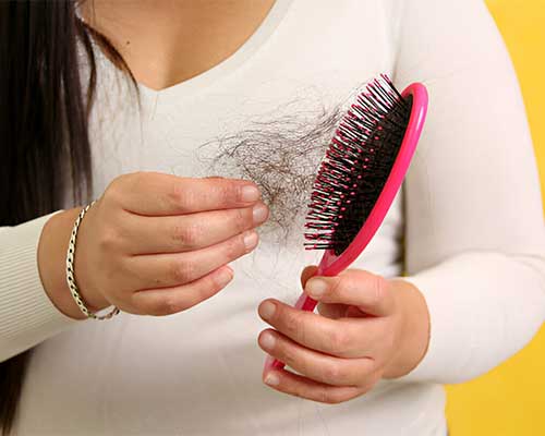 how to stop hair loss after giving birth